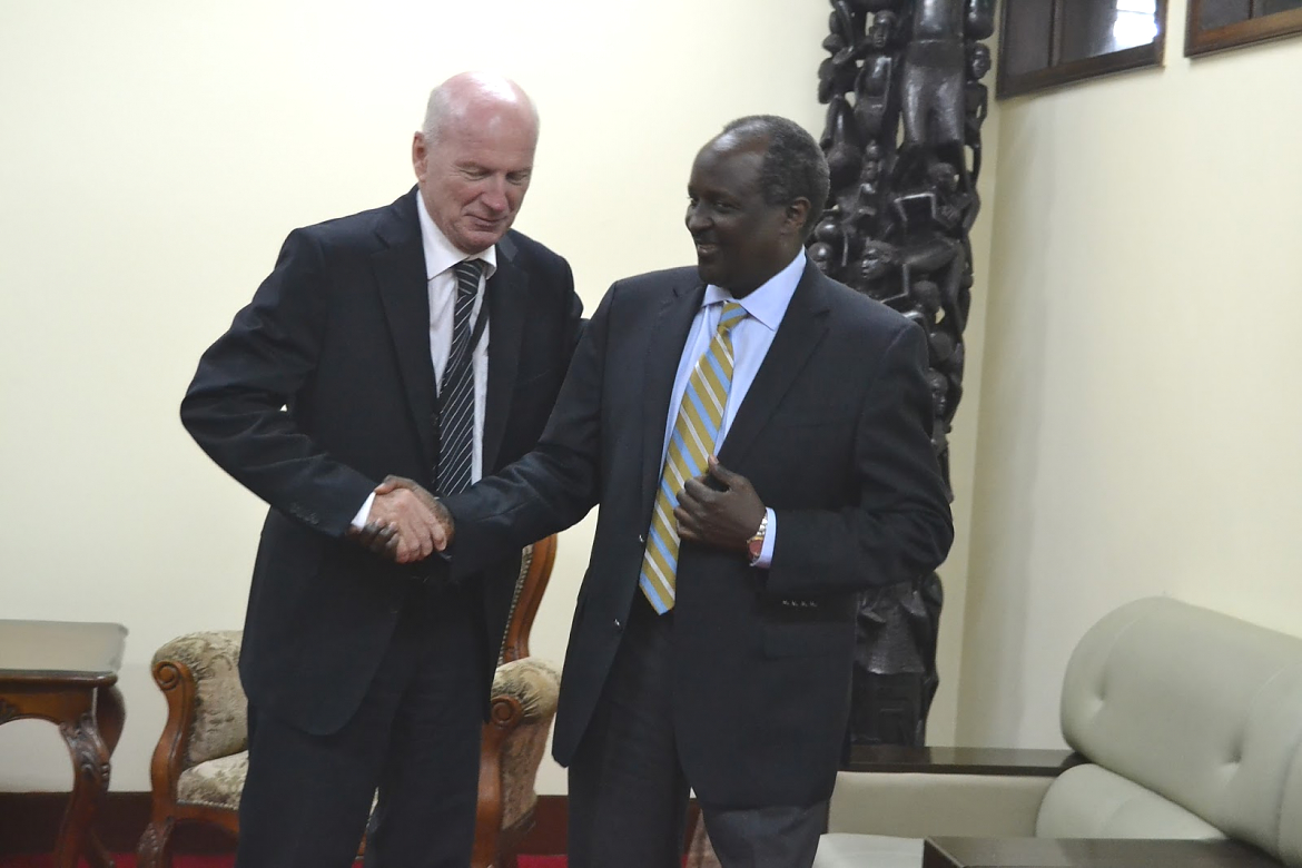 Amb. Sokoine and EU Head of Delegation to Tanzania shake hands after their discussion.
